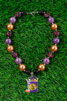  Purple & burnt orange bubble necklace w/bucket of candy. 3PCS/$15.00 ACG40153012