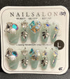 Women press on acrylic nails. (Handmade)