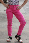 Fuschia ripped skinny jeans. PNG25133064 JEANN