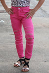 Fuschia ripped skinny jeans. PNG25133064 JEANN