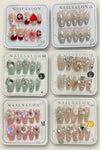 Women press on acrylic nails. (Handmade)