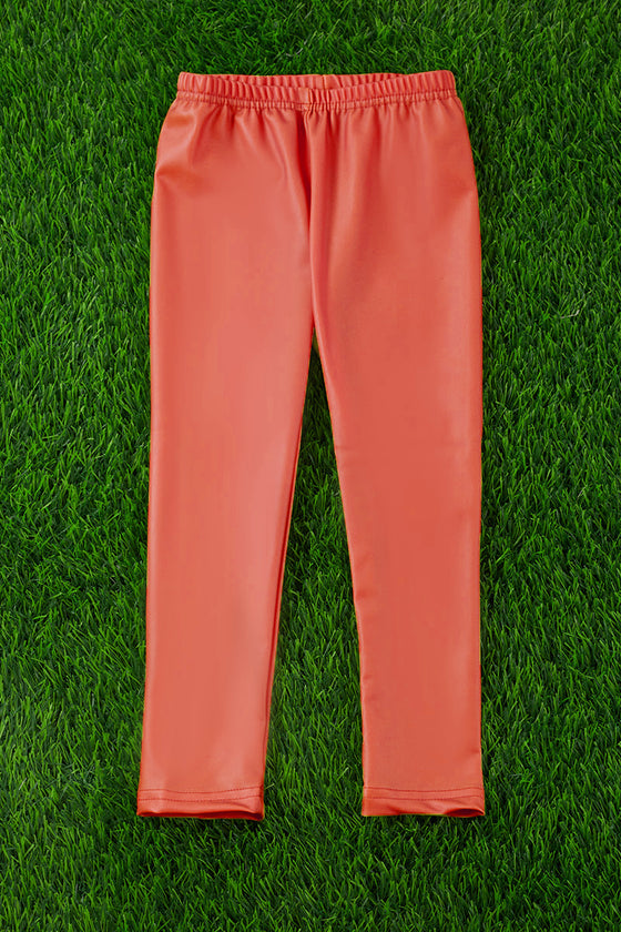 Orange pleather girls satin silk stretchy leggings.