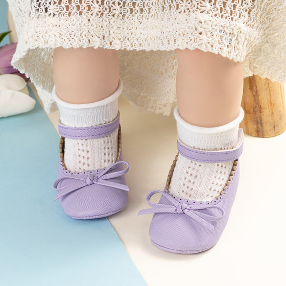 Lavender front bow baby shoes. CG5364