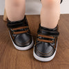 Black leather with brown tone. CG5142