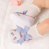 Embroidered girls baby shoes with front bow.