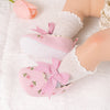 Embroidered girls baby shoes with front bow.