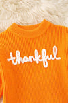 Orange Thankful knit sweater with embroidered flowers on sleeves. TPG60420 JEAN