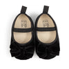 Front Bow velvety baby shoes, available in black and pink.