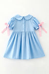 Lt Blue smocked dress with bubble sleeves. DRG64533 AMY