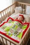 32 inch X 32 inch Green & red Christmas printed baby blanket.