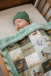 32 inch x 32 inch multi printed duck baby blanket with mint faux fur.