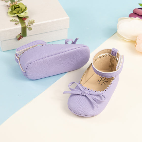 Lavender front bow baby shoes. CG5364