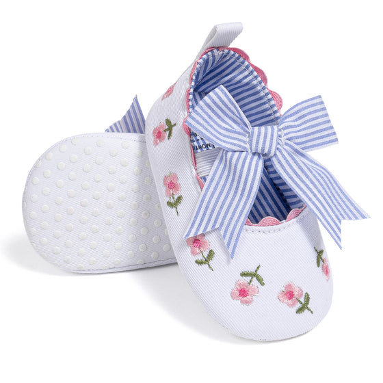 Embroidered girls baby shoes with front bow.