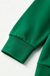 Green Christmas character printed long sleeve top. TPG60763 Bre