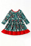 Nutcracker printed girls dress with red ruffle hem and open back with bows. DRG65443 AMY