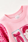 Ho Ho Ho" Pink Christmas sweater with sequins sleeves. TPG60766 SOL