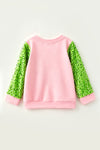 LT. Pink Christmas character and greens sequins sleeves. TPG60771  SOL