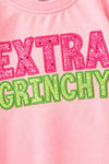 Extra Grin--chy character printed pink top with green sequins sleeves. TPG60770 AMY