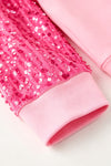 Bubble gum blowing Christmas character pink top with sequins sleeves. TPG60767 AMY