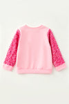 Bubble gum blowing Christmas character pink top with sequins sleeves. TPG60767 AMY