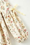 Ivory floral printed girls dress with lace hem and bubble sleeve. DRG64564 MON