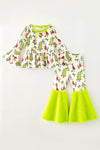 Christmas character printed on white and lime green faux fur bell bottoms. OFG63371 SOL
