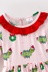 Christmas character on lt. pink dress with red ruffle hem. DRG65528 SOL
