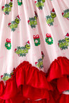 Christmas character on lt. pink dress with red ruffle hem. DRG65528 SOL
