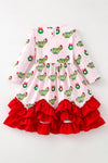Christmas character on lt. pink dress with red ruffle hem. DRG65528 SOL