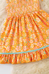 Orange ditsy floral w/mauve green ruffle trim smock dress. DRG60499 SOL