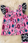 Howdy, concho,bull skull Pink tunic with cow printed angel sleeves & matching bottoms. OFG60709 SOL