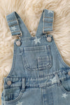 Lt. Blue star bleached denim overalls with distressed detail. PNG50818 AMY