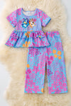 Purple & blue floral ruffle tunic & pants.  OFG50526 SOL