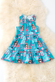  Teal Swif*e printed girls dress. DRG51069 AMY