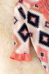 Pink aztec printed baby onesie with ruffle trim. RPG53246 SOL