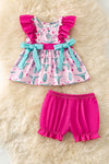 Blue printed bull skull tunic w/side bows and fuchsia sleeve accent and baby shorts. RPG61193 SOL