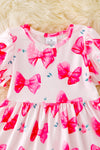 Bubble sleeve Coquette-Bow printed dress w/ruffle hem. DRG41230 WEN