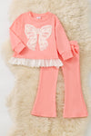 Lt. Coral Cream lace bow and ruffle hem and coral pants. OFG61397 SOL