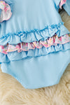 Lt blue boots applique baby bodysuit with floral ruffle on sleeves and ruffle butt. RPG61922 SOL