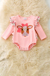 Pink cow applique baby bodysuit with floral ruffle on sleeves and ruffle butt. RPG61924 SOL