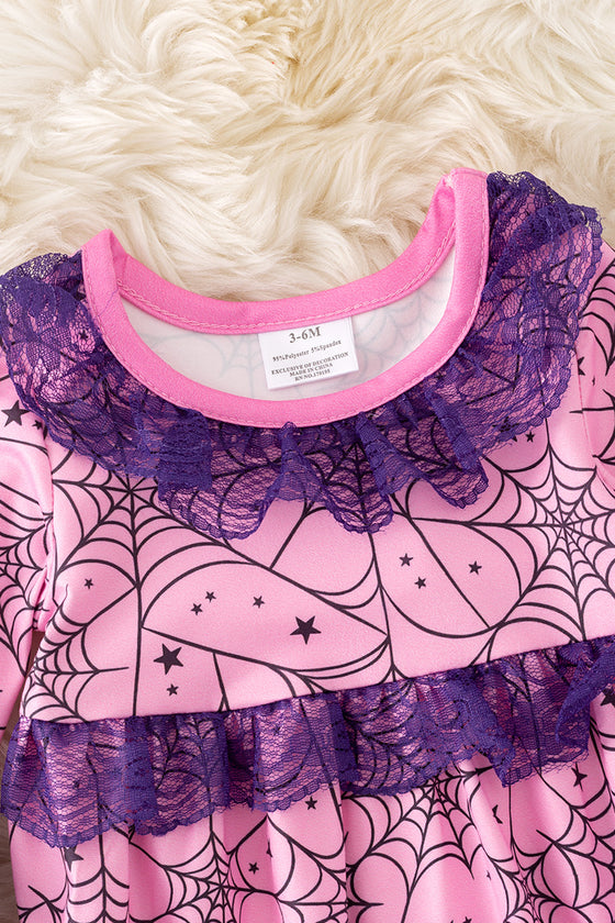 Spider web printed on pink baby onesie with purple lace and bell sleeves. RPG50951 SOL