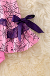 Spider web printed on pink baby onesie with purple lace and bell sleeves. RPG50951 SOL