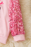 Howdy Grinch" Pink sweatshirt with sequins sleeves. TPG51374 SOLL