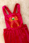 Christmas character on fuchsia velvety fabric romper. PNG50763 SOL