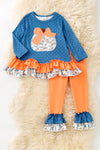 Blue top w/white polka dot & ruffle hem and orange pants. OFG61765 JEAN