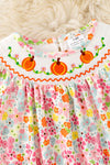 Floral smock baby romper with snaps. RPG62710 SOL