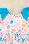 Easter printed dress w/turquoise contrast ruffle trim. DRG20114006 Jeann