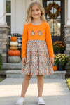 Floral ghost applique on orange dress. DRG63041 JEAN