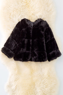  TPG40413 NAYDINE: Black faux fur cozy jacket.