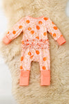 Pumpkin printed on pink baby romper with ruffle trim. RPG62349 SOL